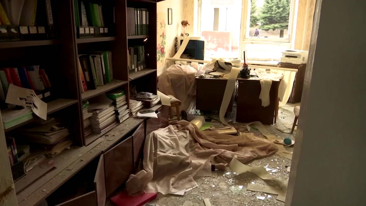 National Post | 'Surviving through it is hard': resident of shell-hit ...