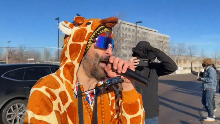 Man in giraffe costume brutally detained by ICE as Minneapolis descends into chaos